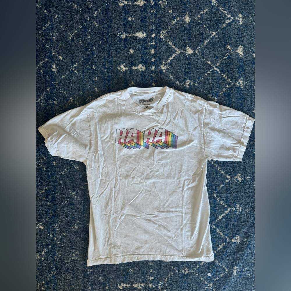 White oversized tshirt with multicolor print in size Medium.